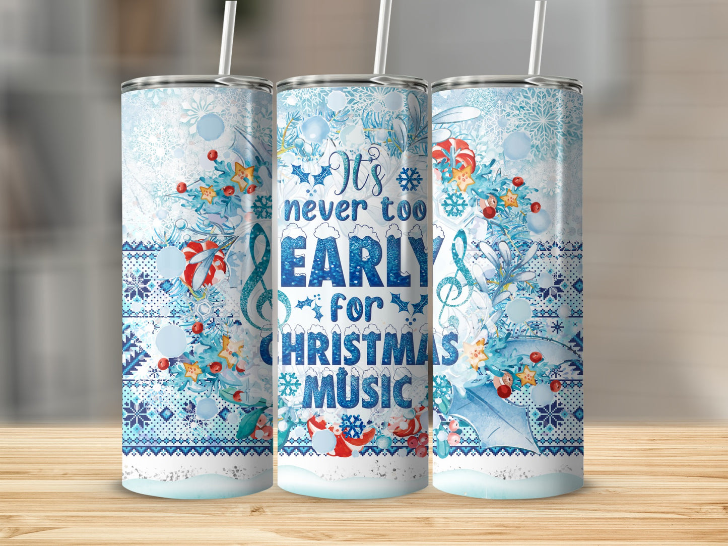 Blue and white patterned tumbler with "It's never too early for Christmas music" text.