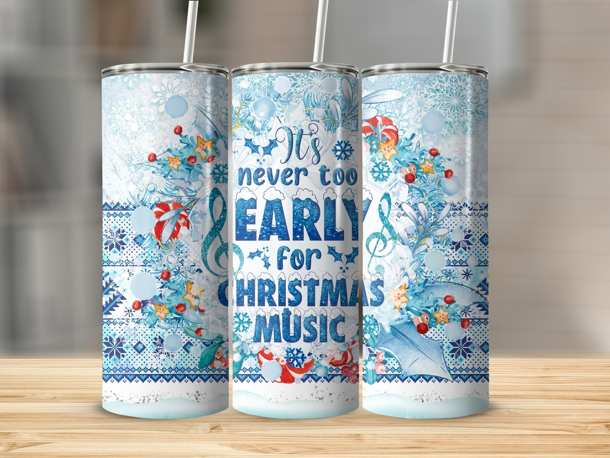 Blue and white patterned tumbler with "It's never too early for Christmas music" text.