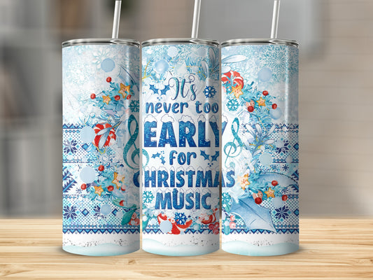 Blue and white patterned tumbler with "It's never too early for Christmas music" text.