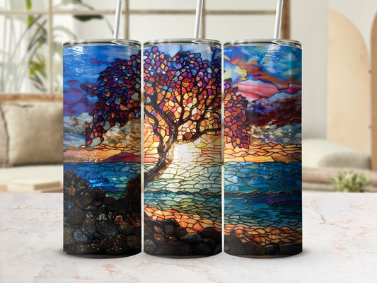 Stained glass tree with sunset over water, on three tumblers.