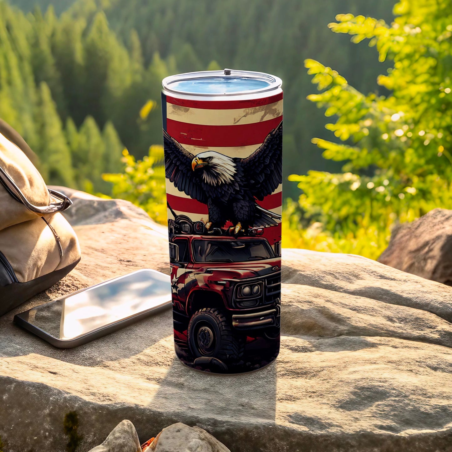 Red truck and eagle design on a stainless steel tumbler.