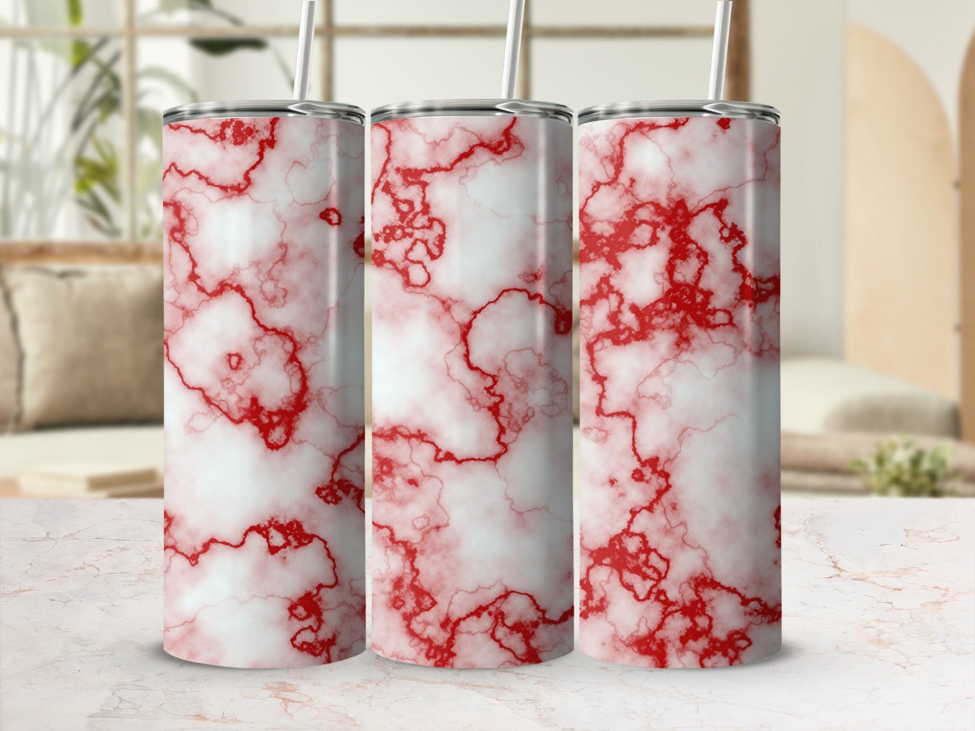 Three tumblers with a red and white marble pattern.