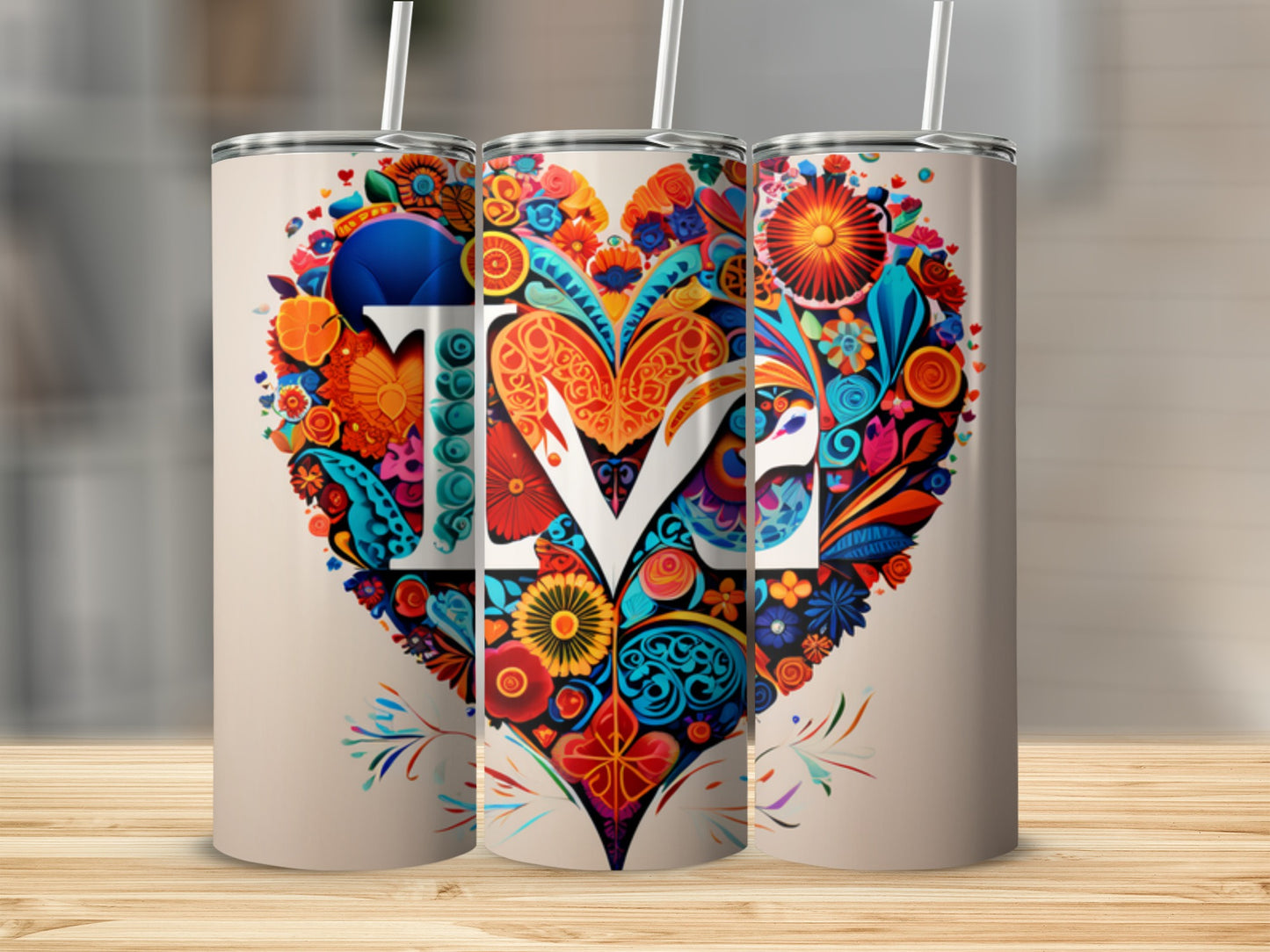 Tumbler with colorful floral heart design and "MOM" text.