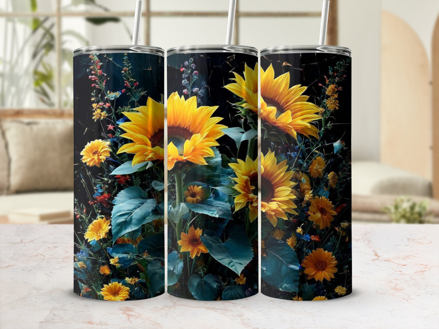Sunflower floral pattern on a set of three stainless steel tumblers.