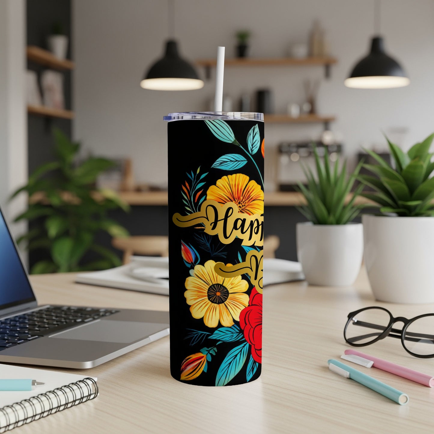 Black tumbler with floral design and "Happy Mom" text.