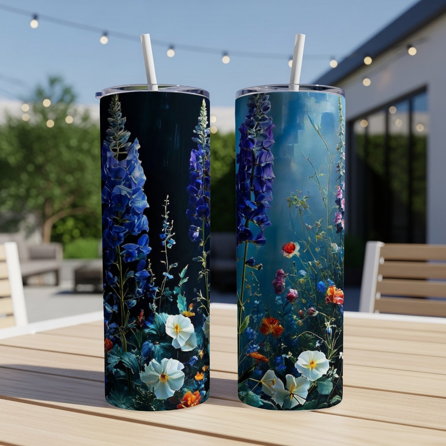 Two tumblers with floral designs, one with blue flowers, the other with colorful wildflowers.
