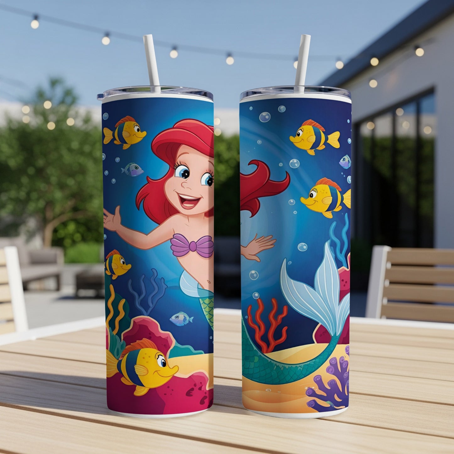 Ariel the Little Mermaid with fish and coral on a skinny tumbler.