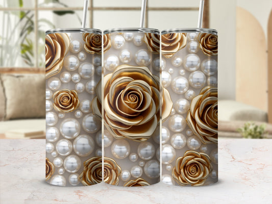 Gold roses and pearls pattern on three tumblers with straws.