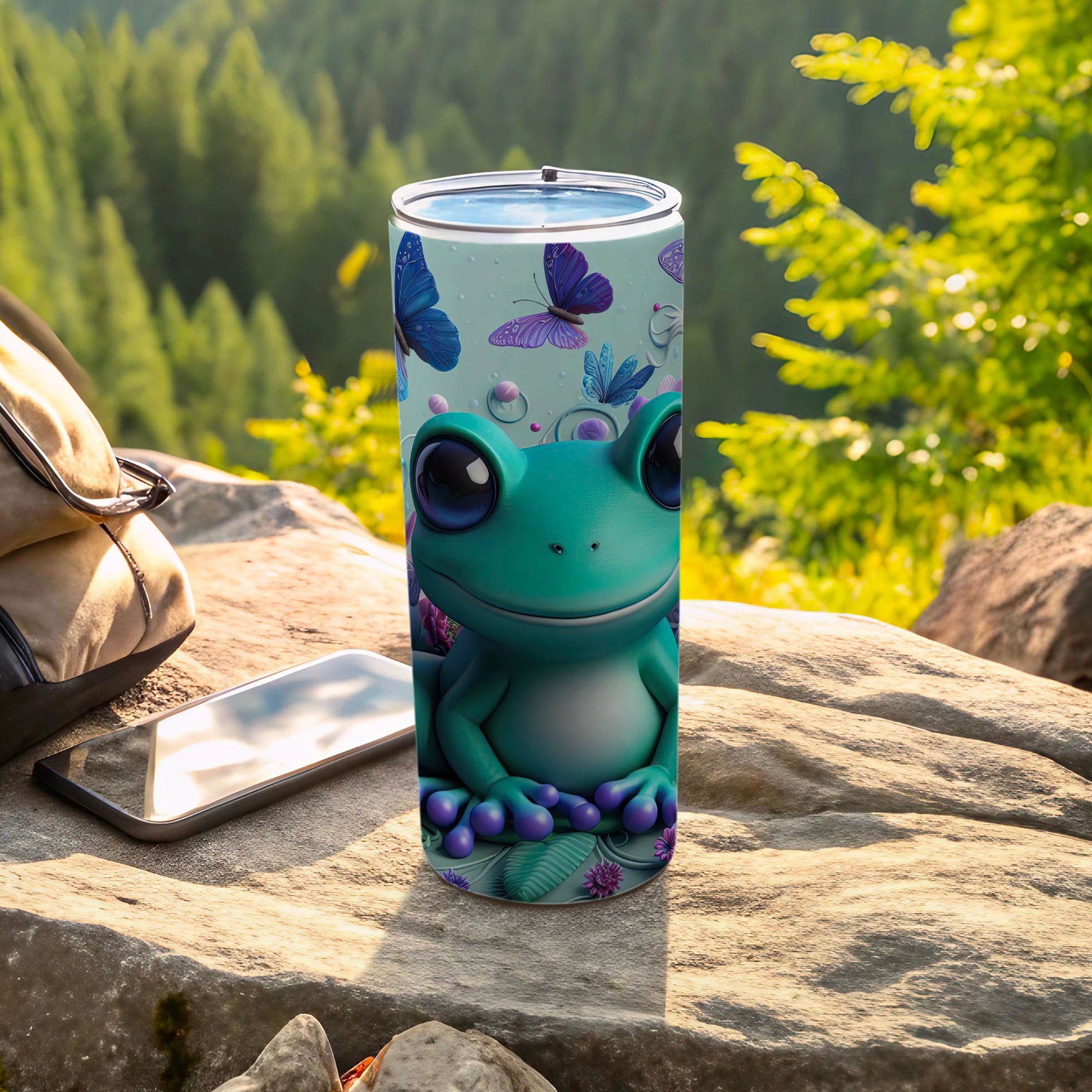 Green frog with big eyes and butterflies on a tumbler.
