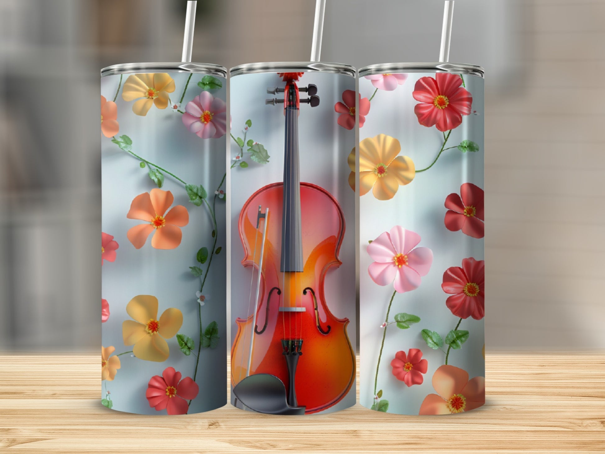 Violin and floral pattern on a set of three tumblers.