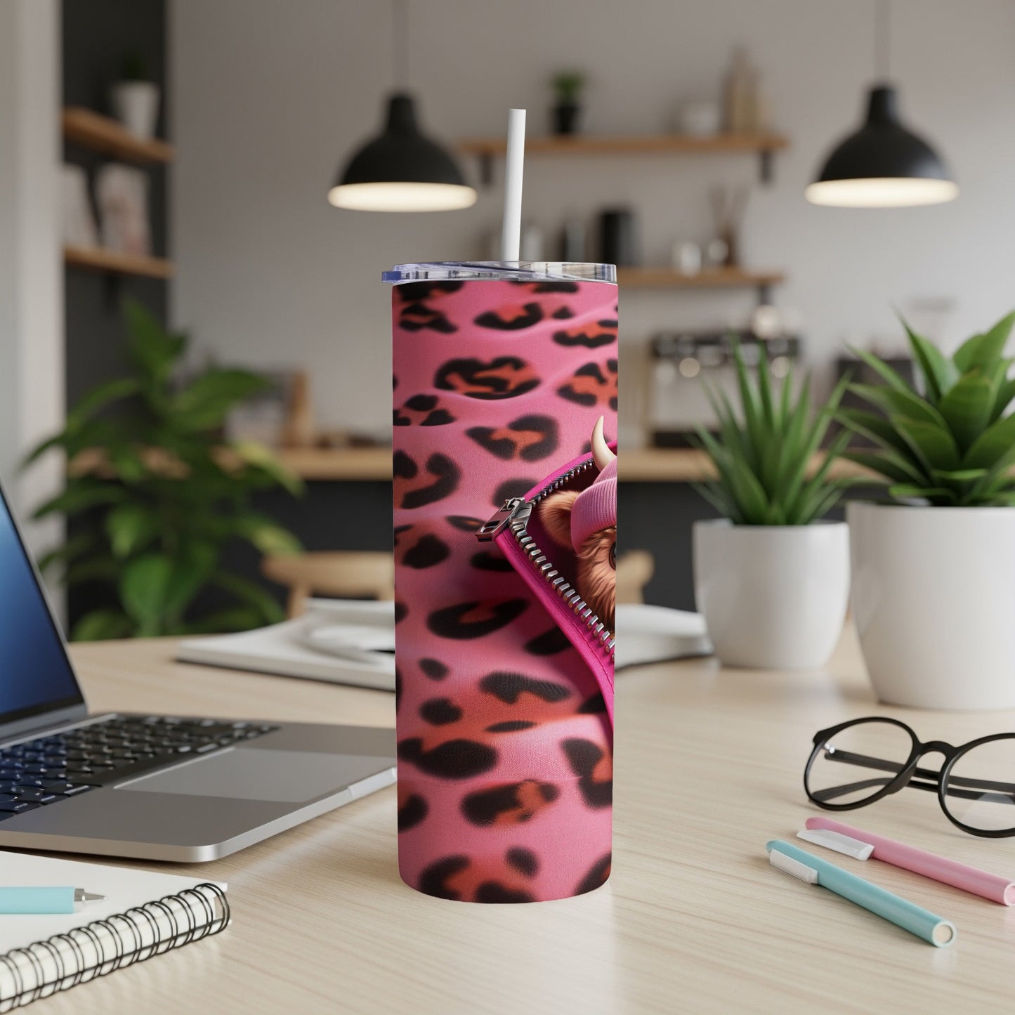 Pink leopard print tumbler with a cute Highland cow peeking out.