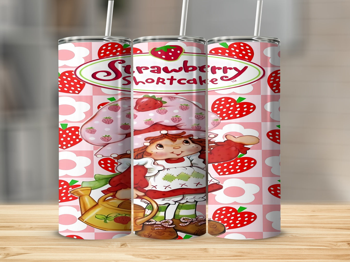 Strawberry Shortcake with watering can on a pink floral background.