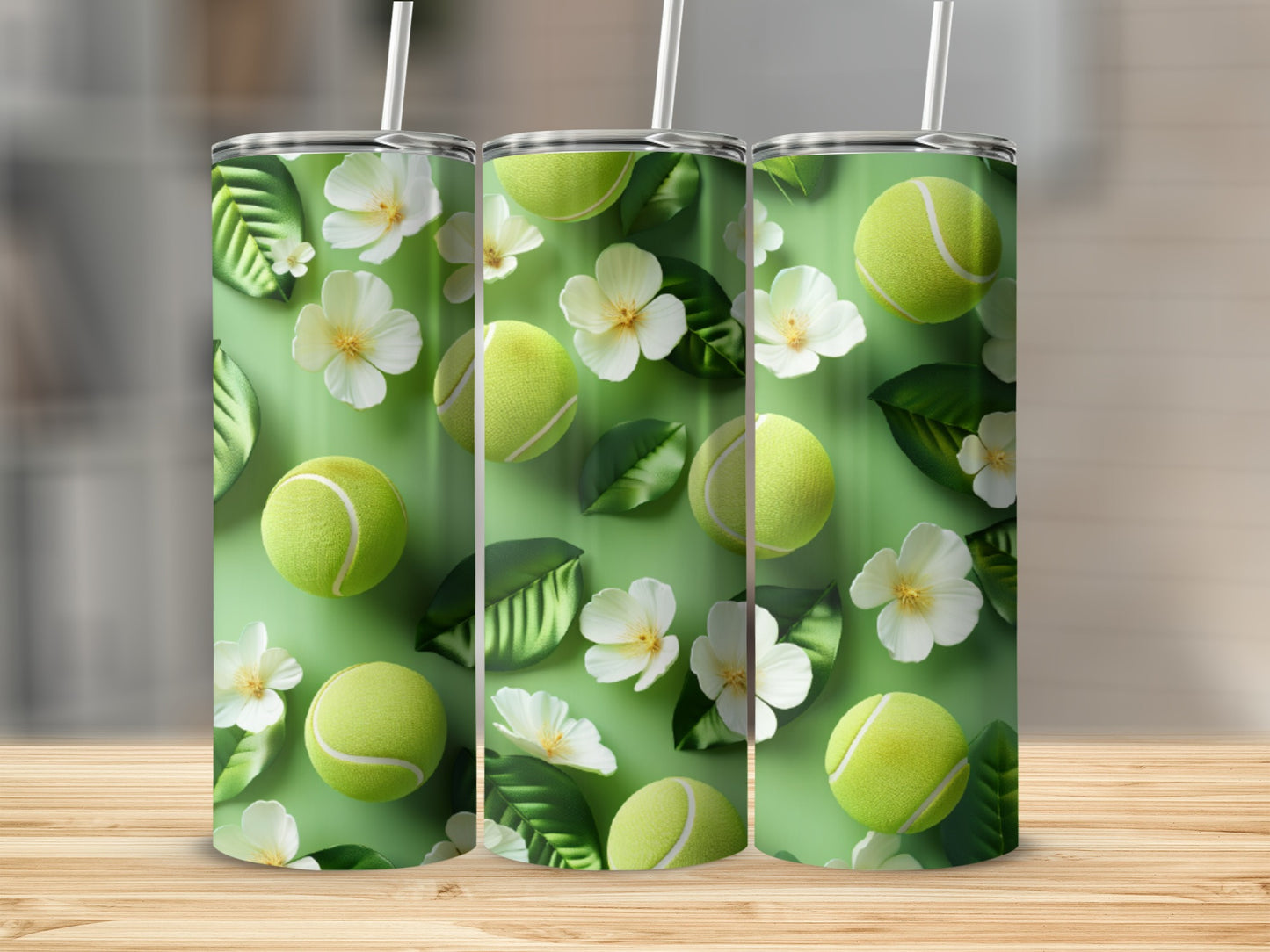 Tennis balls, leaves, and white flowers pattern on a green background tumbler.