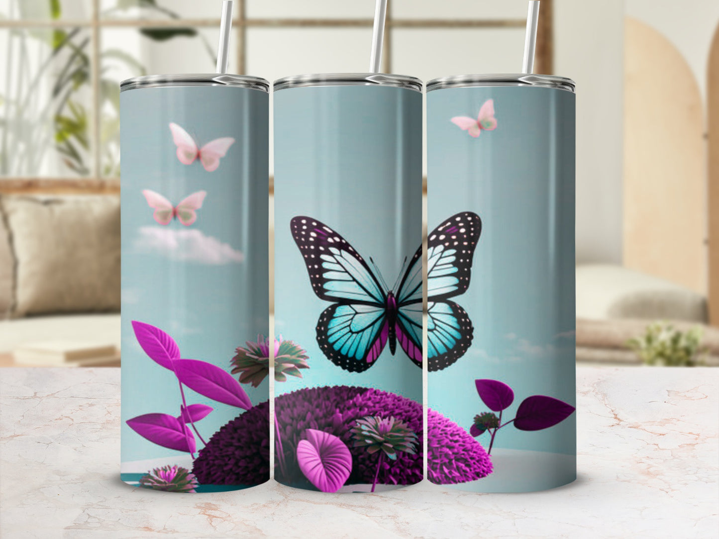 Three tumblers with butterflies and pink foliage on a light blue background.