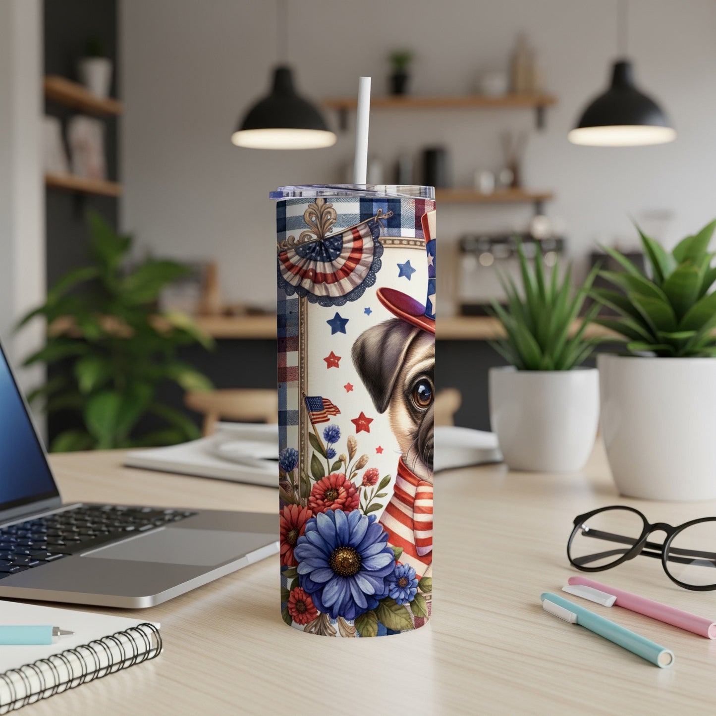 Pug in patriotic bandana and hat surrounded by flowers on a tumbler.