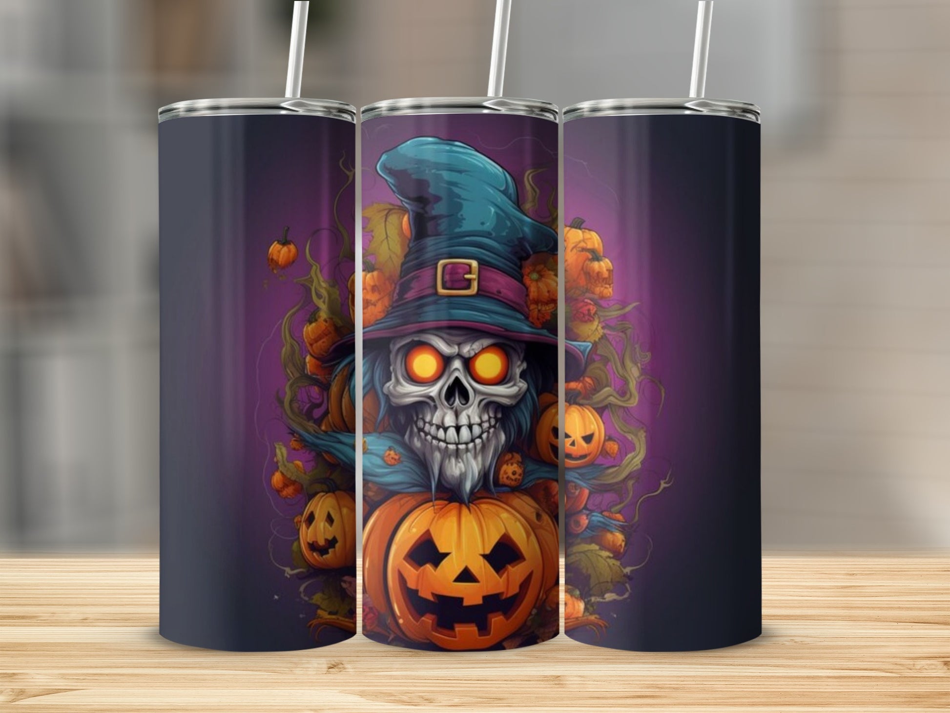 Three tumblers featuring a Halloween skull design with pumpkins and a witch's hat.