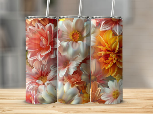 Three tumblers with a floral design featuring dahlias and daisies.
