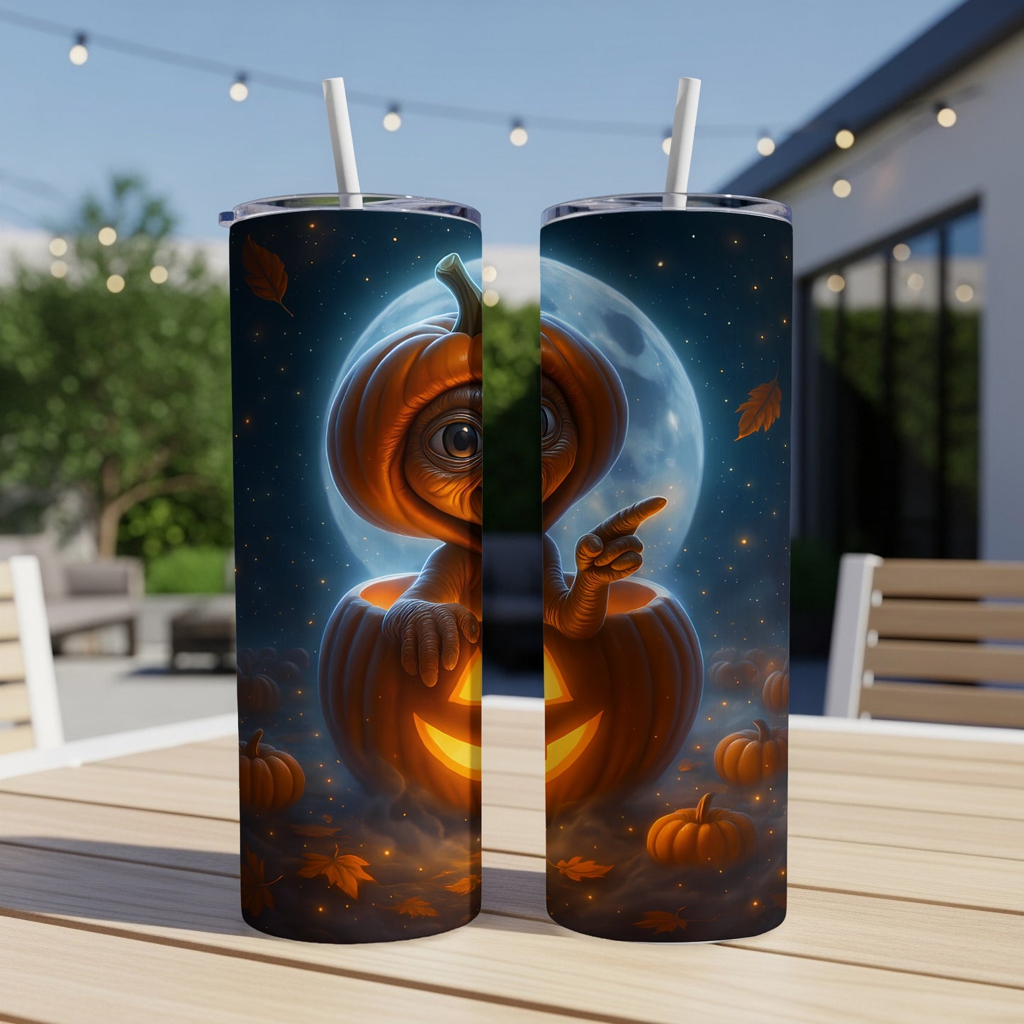 Two tumblers with a Halloween design featuring a pumpkin monster and a full moon.