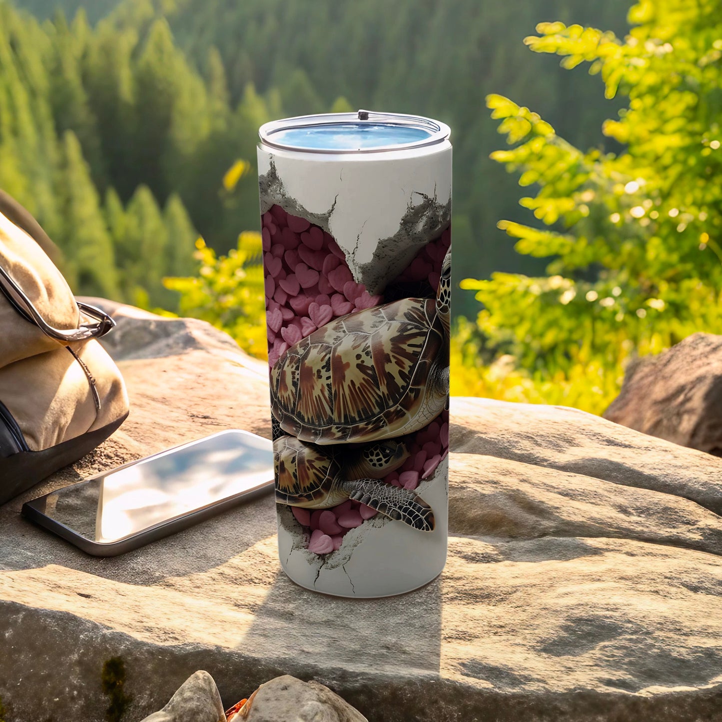 Tumbler with sea turtles emerging from cracked stone and pink hearts.
