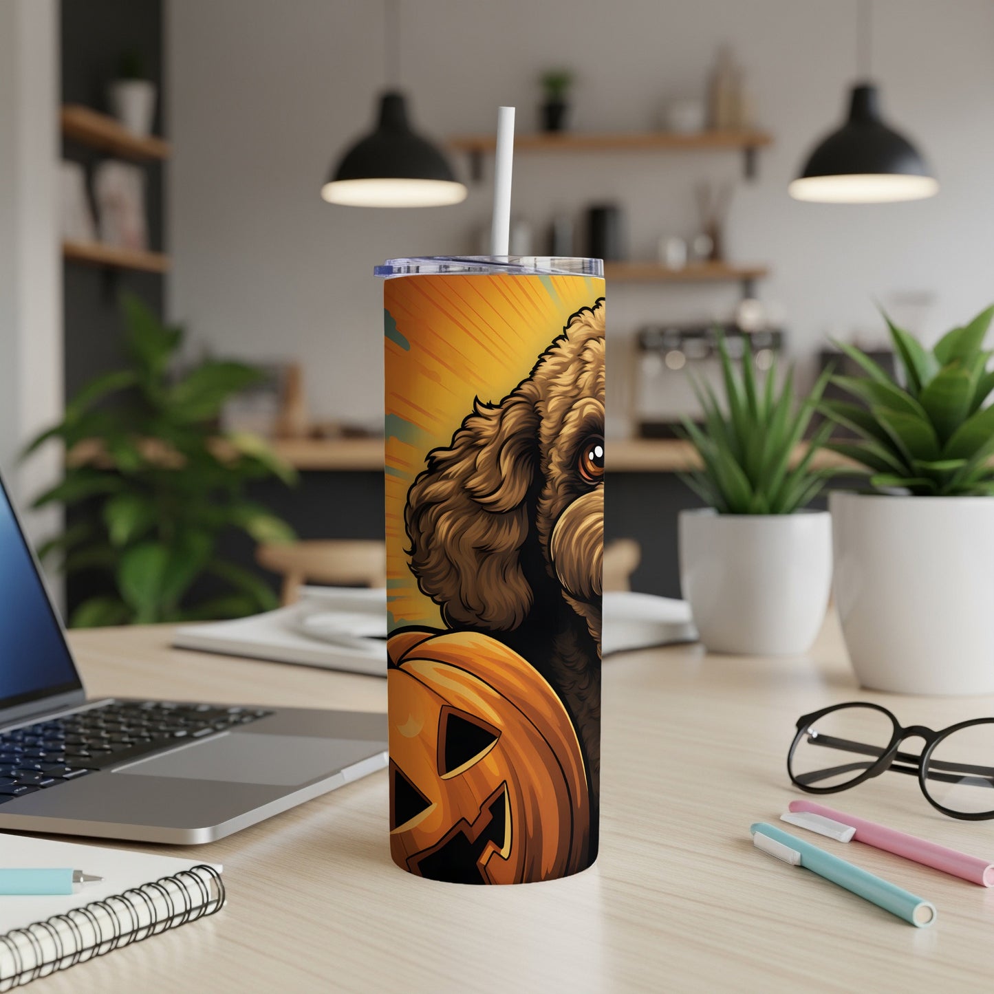 Halloween dog and pumpkin tumbler with a white straw.