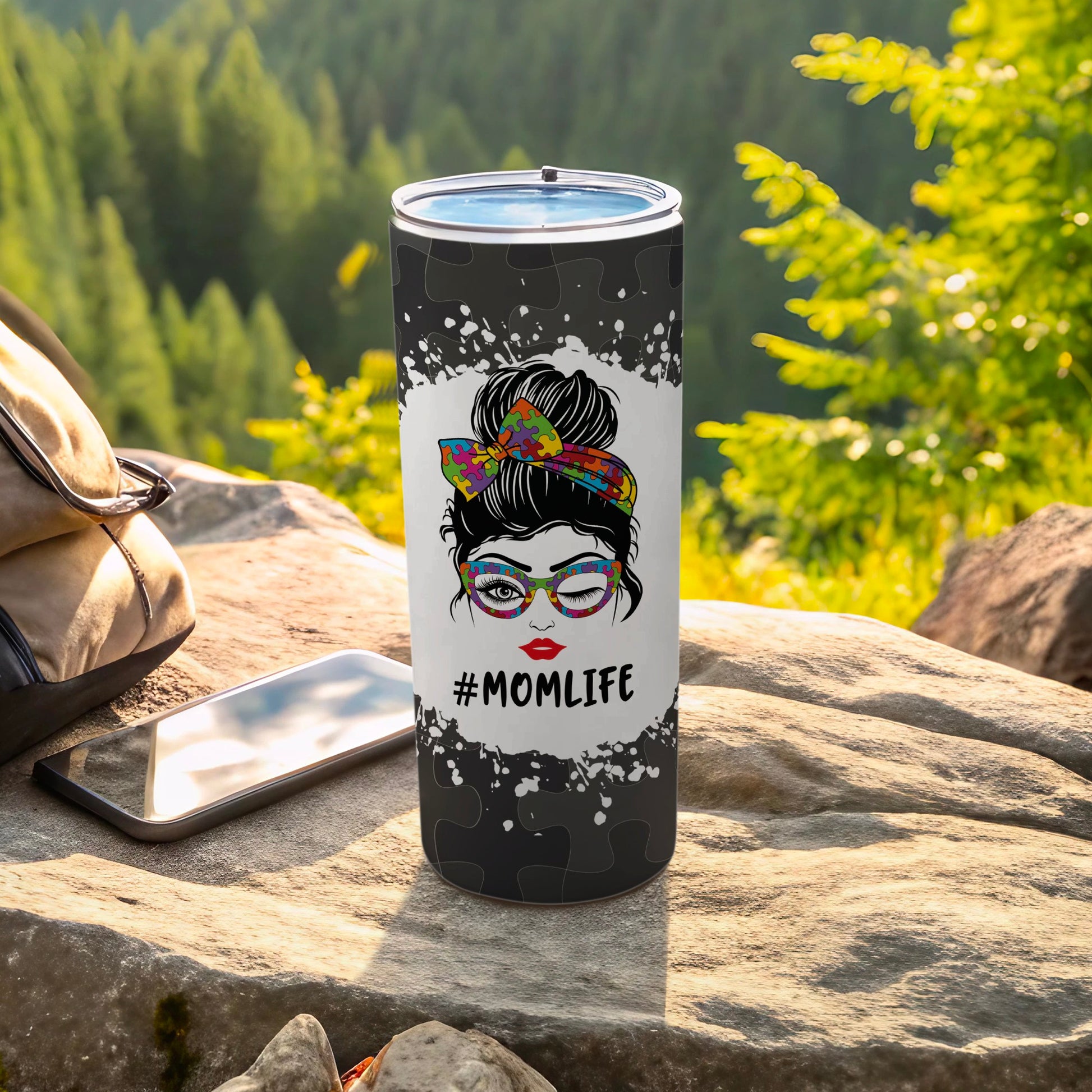 Black tumbler with #MOMLIFE and colorful bandana-wearing woman graphic.