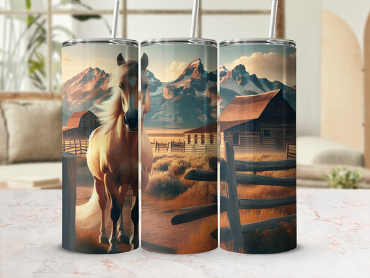 Golden horse in a rural landscape with mountains and barns.