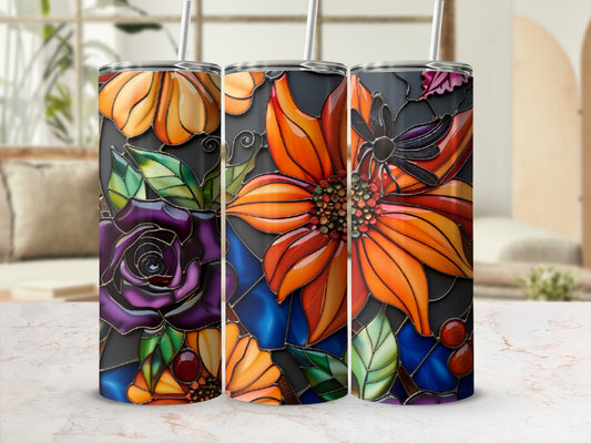 Three tumblers with stained glass floral designs featuring a rose and orange flowers.