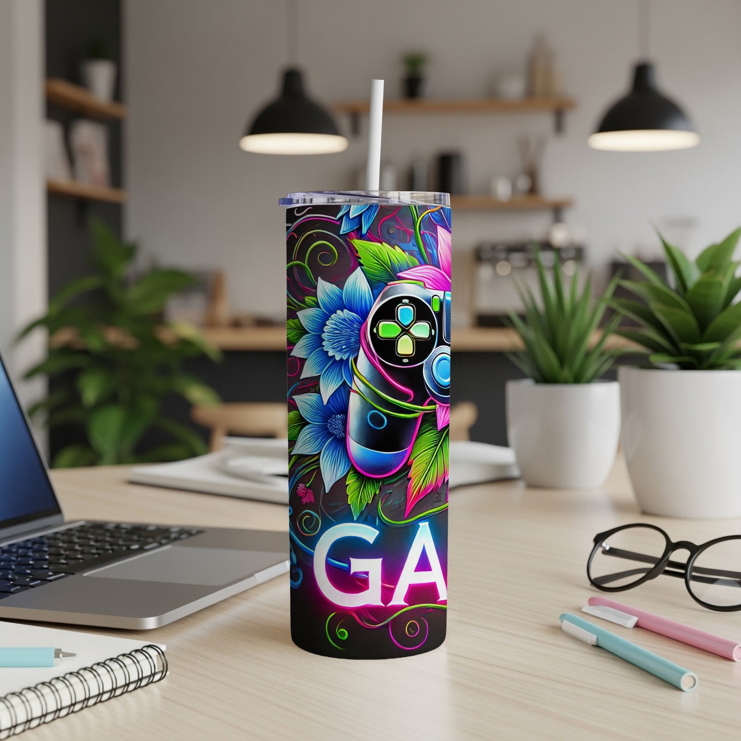 Gamer tumbler with neon controller and floral design.