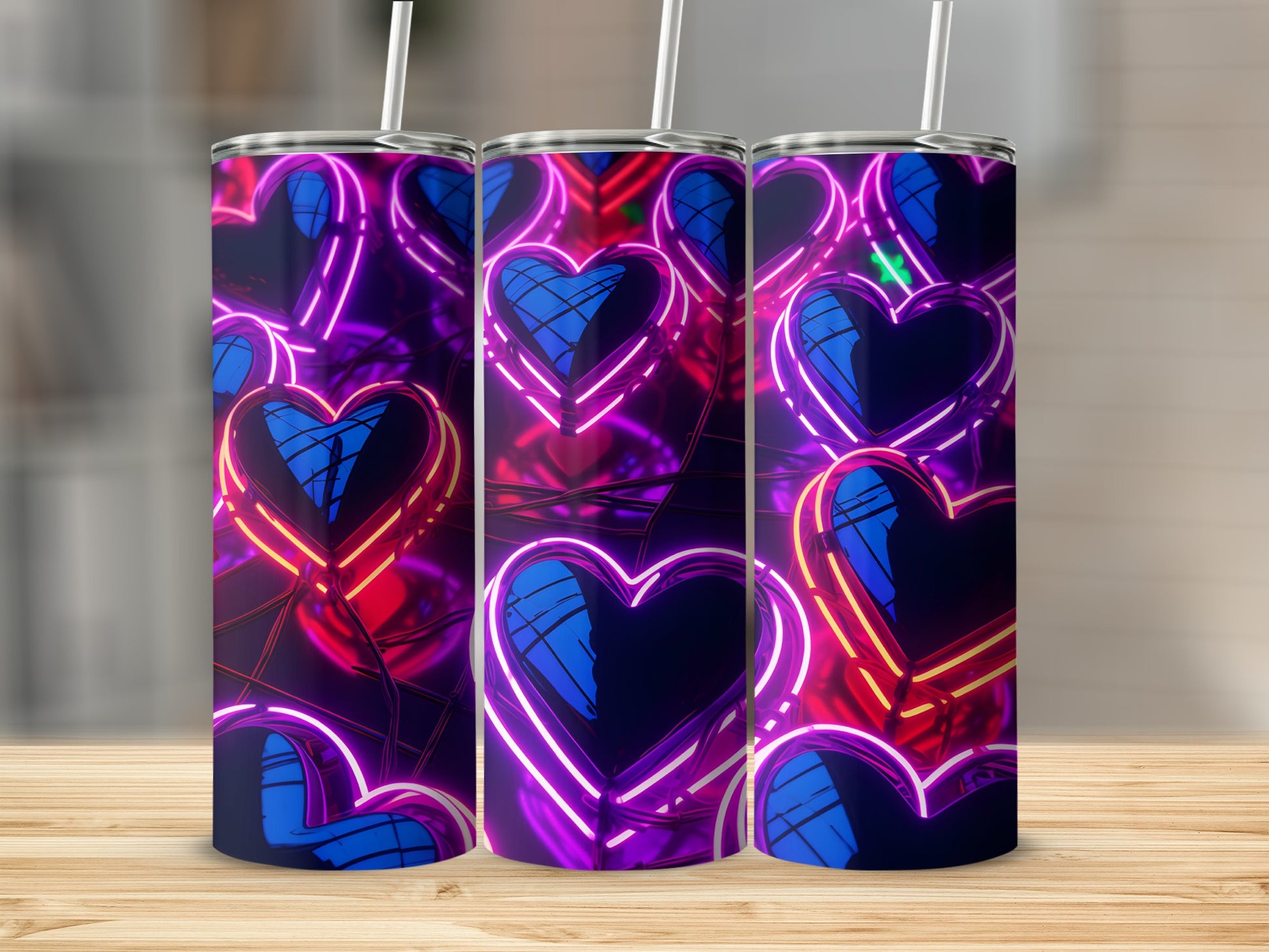 Three tumblers with a neon blue and pink heart pattern.