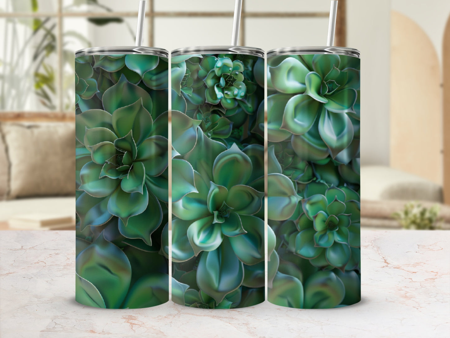 Green succulent plant pattern on three tumblers with straws.