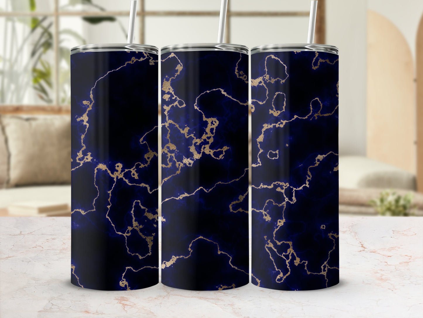 Three tumblers with dark blue and gold marbled pattern.