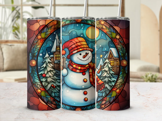 Stained glass tumbler with snowman, trees, and moon design.