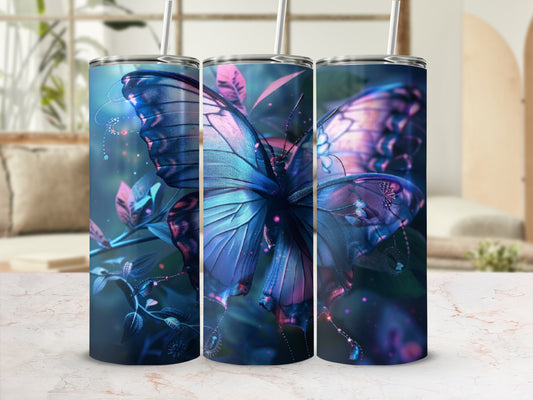 Blue and purple butterfly on a tumbler with delicate foliage.