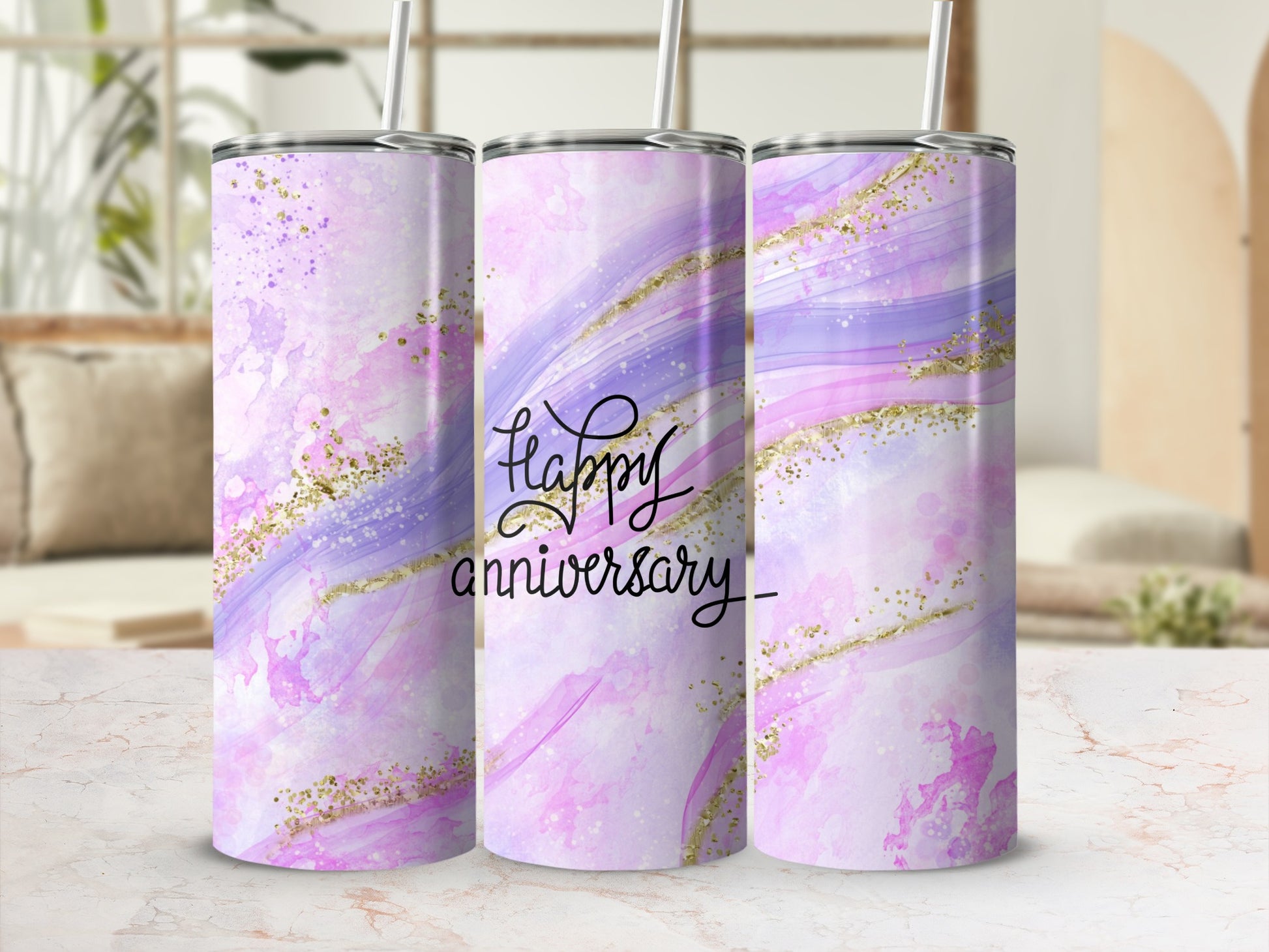 Pink and purple watercolor tumbler with gold glitter and "Happy Anniversary" text.