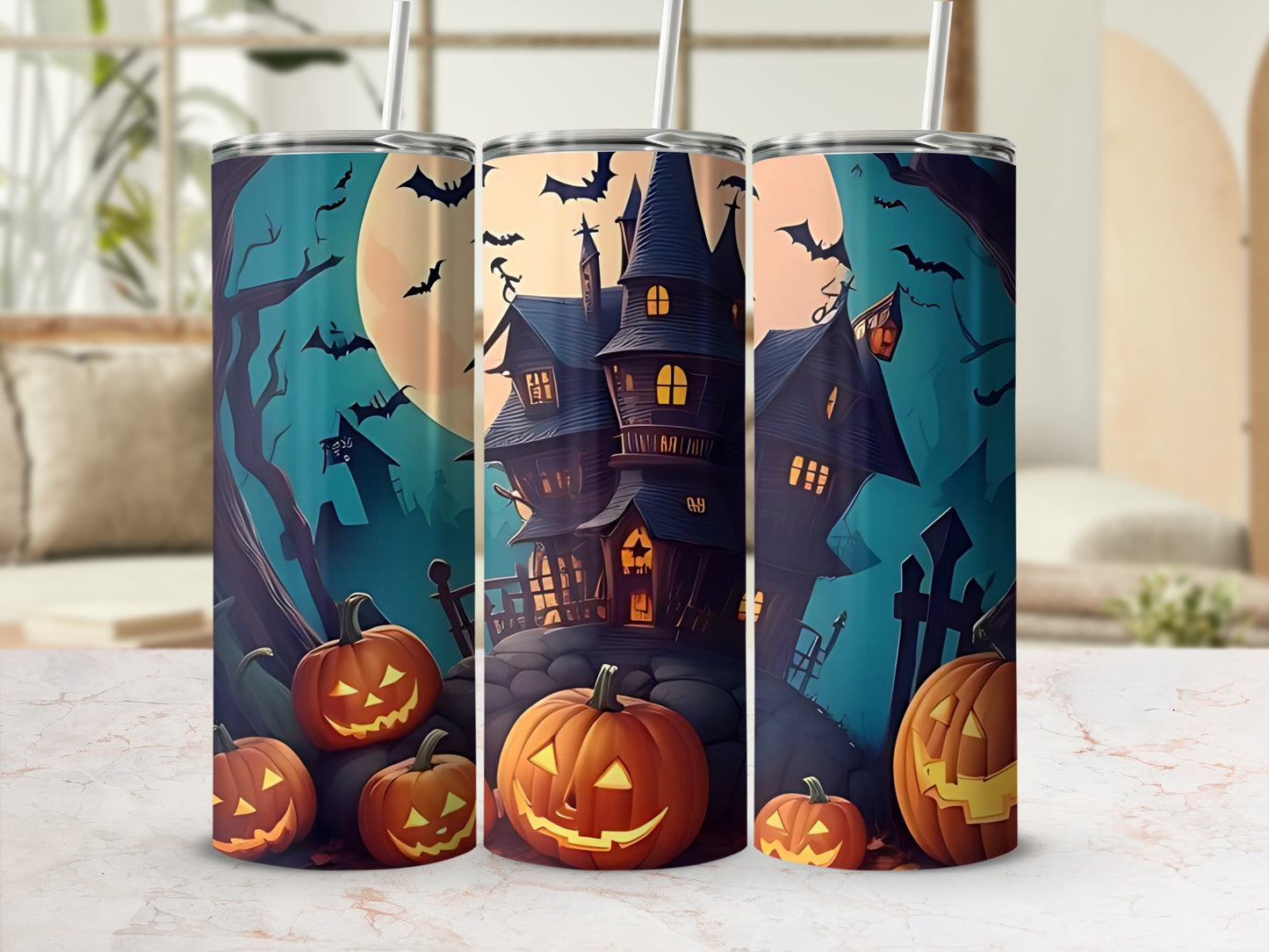 Halloween tumblers with haunted houses, jack-o'-lanterns, and flying bats on teal background.