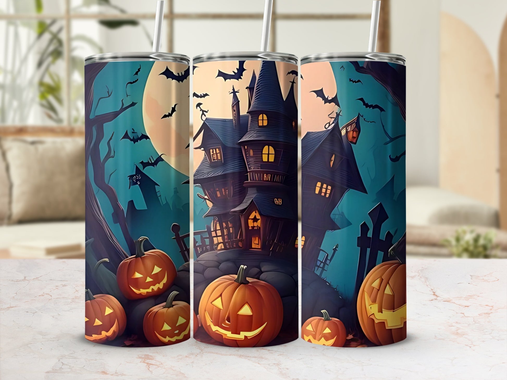 Halloween tumblers with haunted houses, jack-o'-lanterns, and flying bats on teal background.
