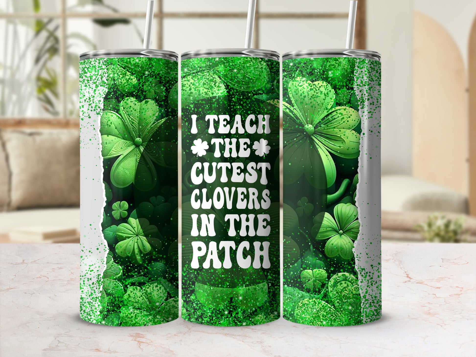 Green tumbler with "I teach the cutest clovers in the patch" text and shamrocks.