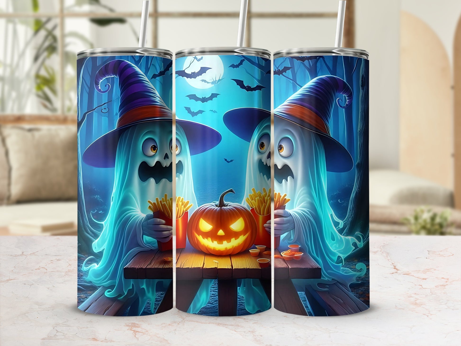 Three tumblers with Halloween ghosts, a jack-o'-lantern, and french fries.