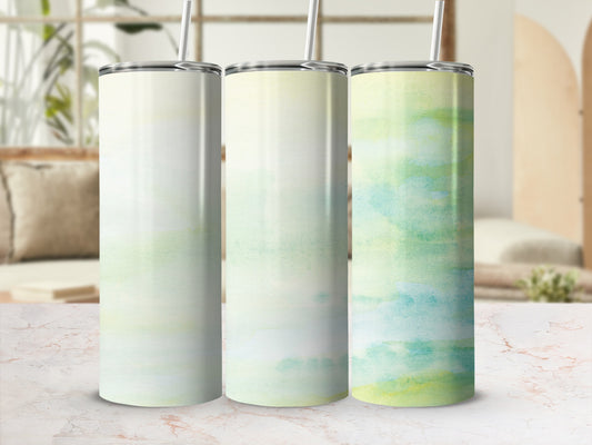 Three tumblers with watercolor-style green and yellow abstract designs.