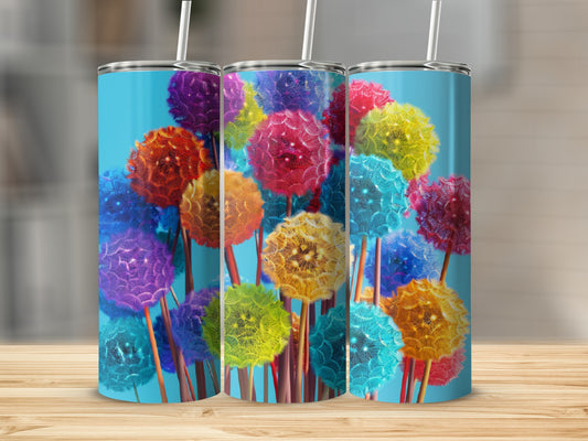 Colorful dandelions on a teal background with wooden table foreground.