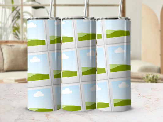 Three tumblers with a landscape photo collage pattern on a marble surface.
