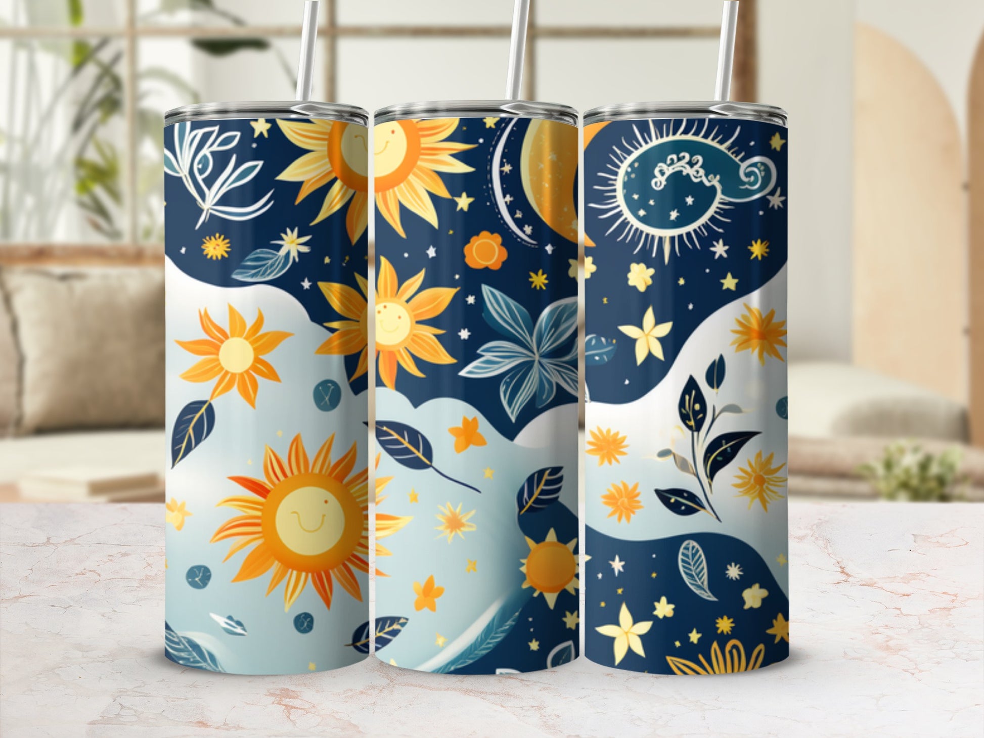 Three tumblers with celestial sun, moon, stars, and floral designs.