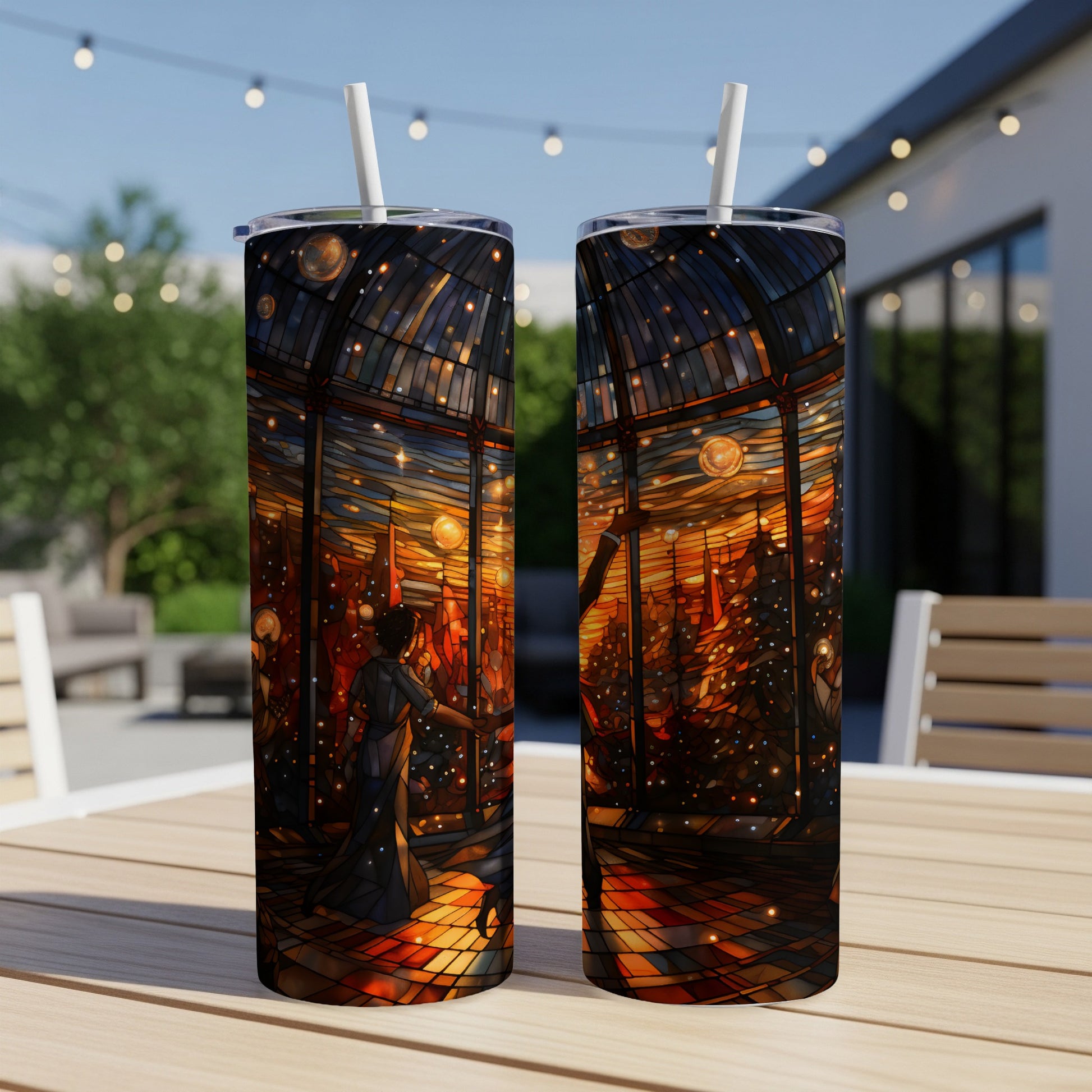 Two stained-glass styled tumblers with a city scene featuring a woman.