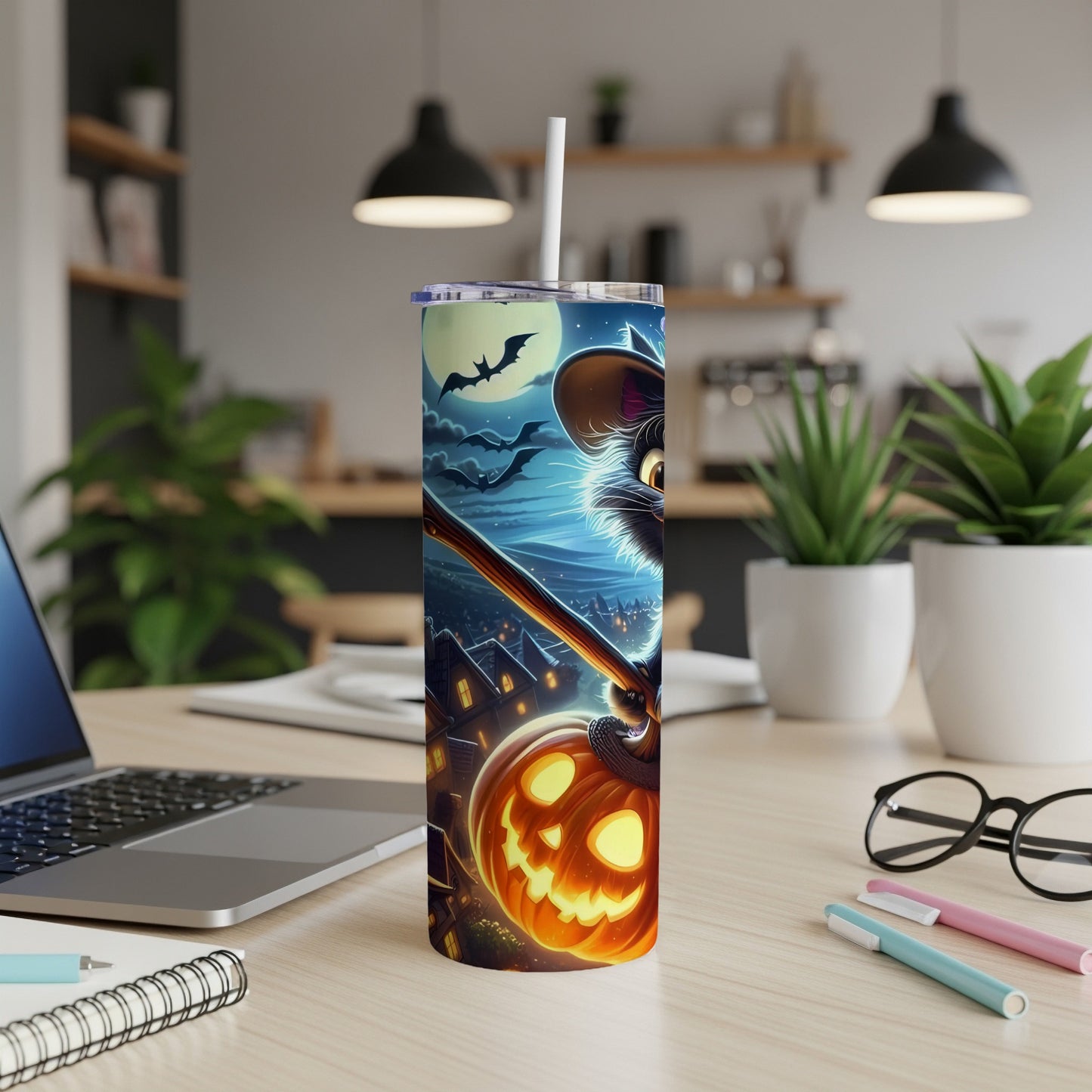 Halloween tumbler with black cat, bats, moon, and jack-o'-lantern.