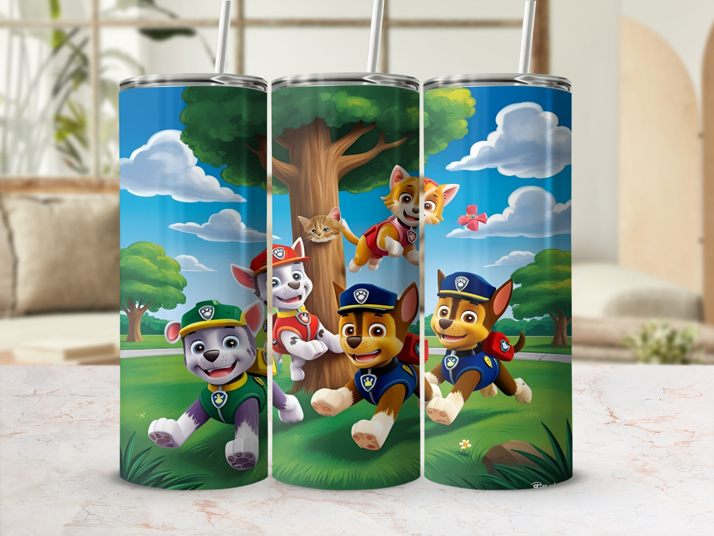 Paw Patrol pups Chase, Marshall, and Rubble running in a park with a kitten.