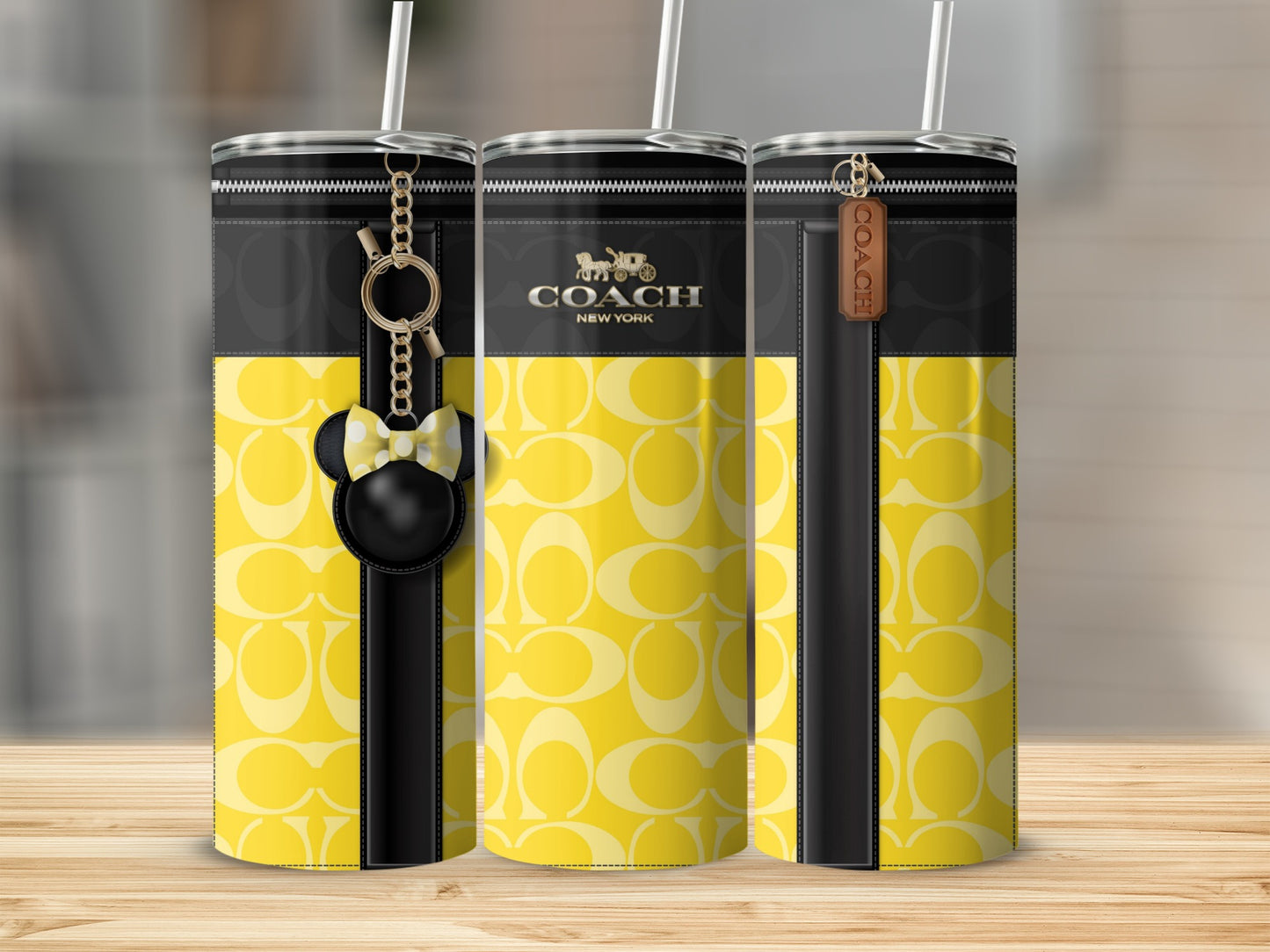 Stylish Yellow Coach Tumbler with Keychain Accessory