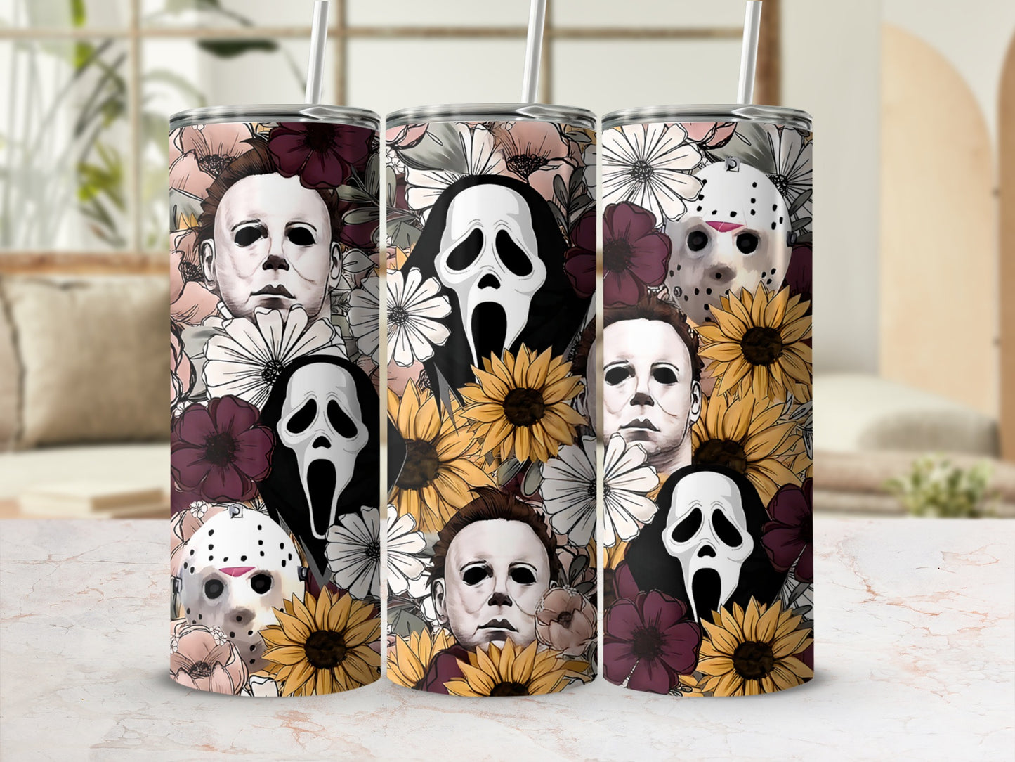Three tumblers featuring horror characters and floral patterns.