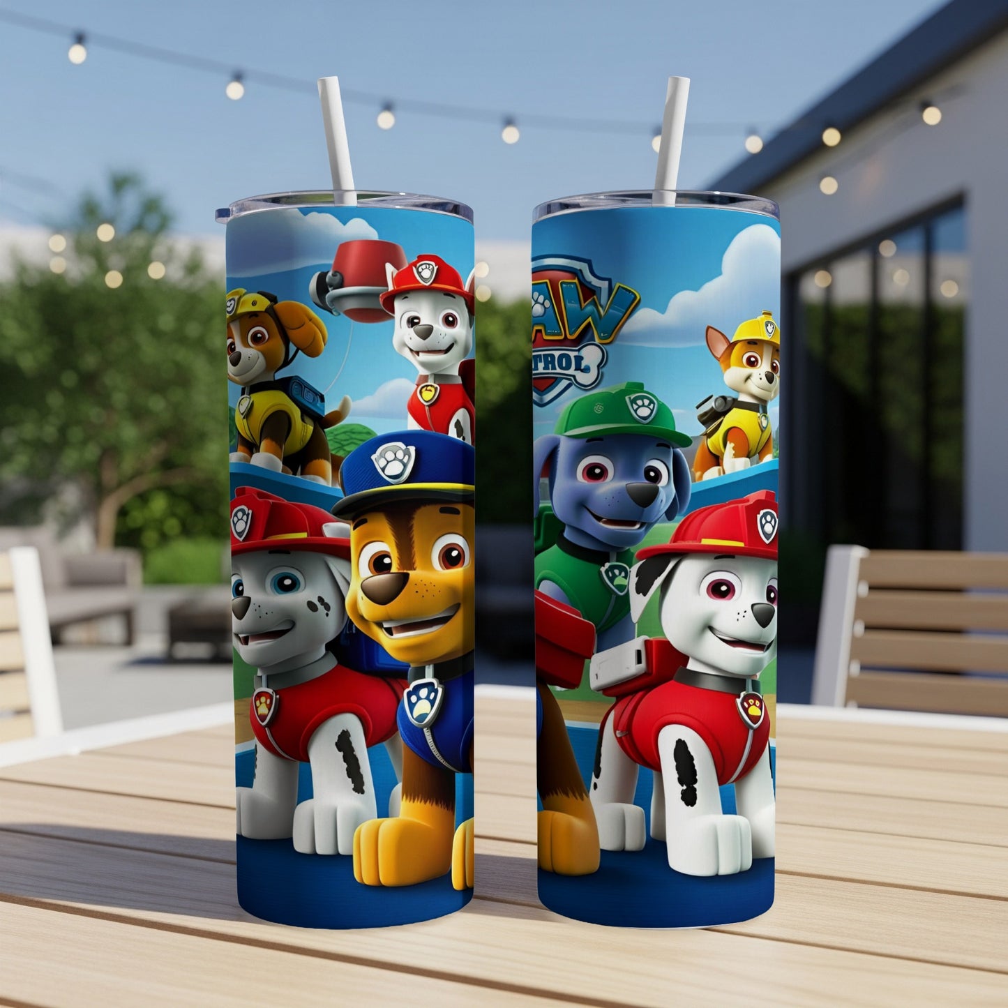 Two Paw Patrol tumblers with characters Chase, Marshall, and Rubble on a table.