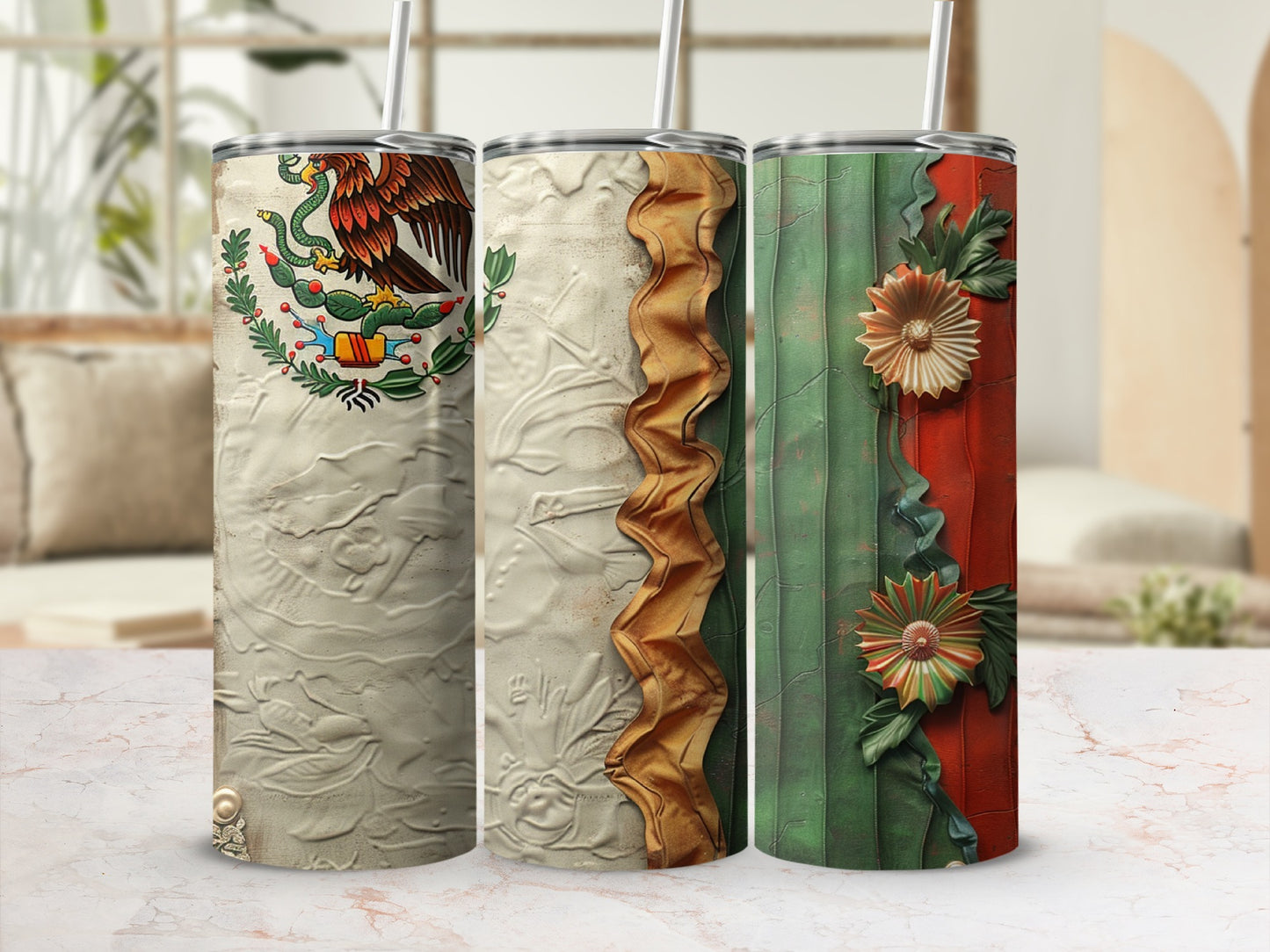 Three stainless steel tumblers with Mexican-inspired designs.