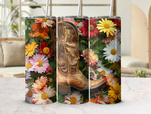 Golden cowboy boot with floral background on a tumbler.
